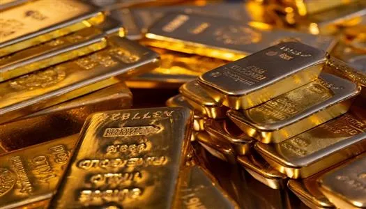 الذهب يحقق مكاسب أسبوعية بدعم تراجع الدولار وسط تصريحات للاحتياطي الفيدرالي تحد من المكاسب